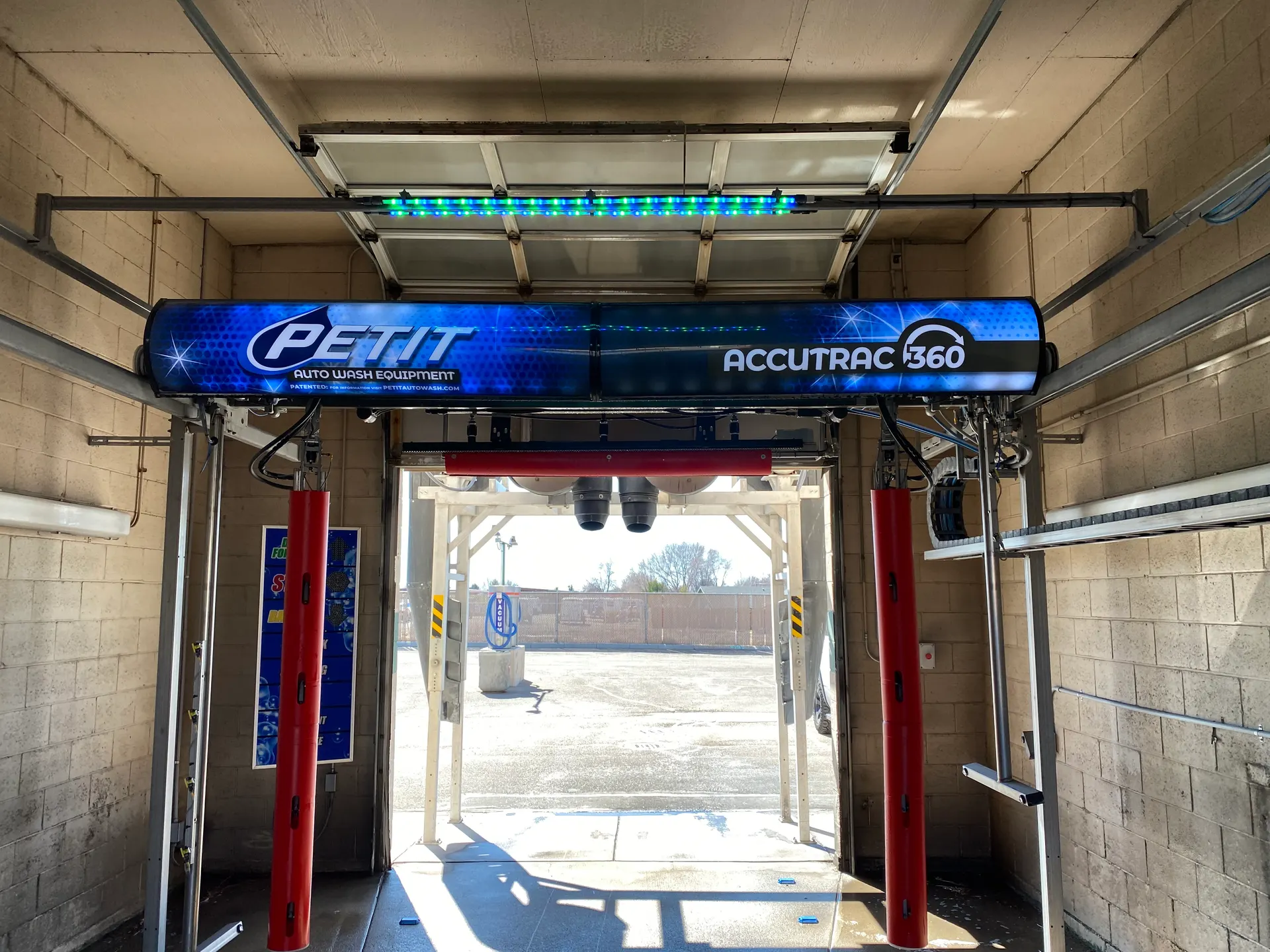 Petit AccuTrac 360 touchless automatic tunnel entrance at Mr Clean Car Wash in Nampa, Idaho